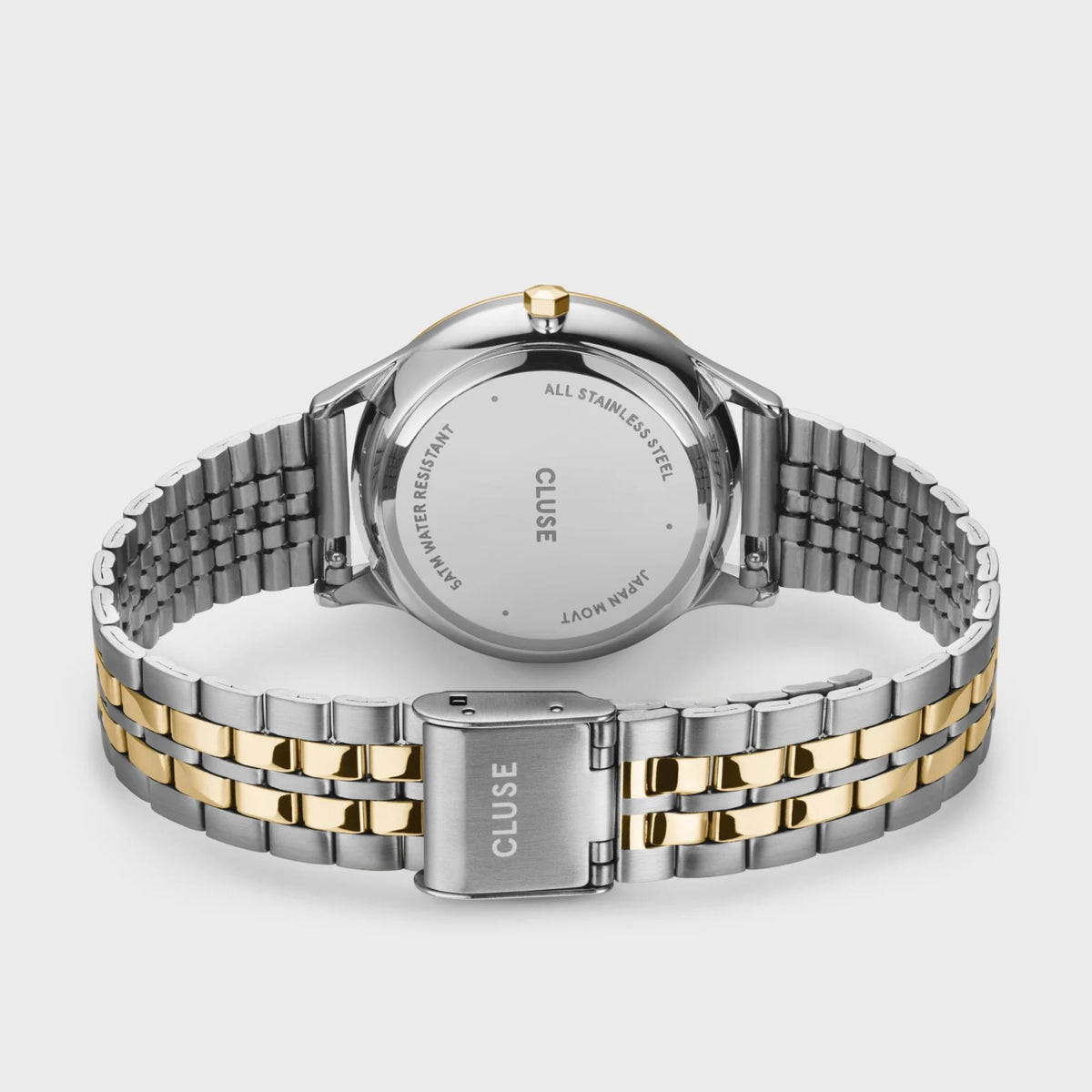 Women’s chronograph watch back close-up with stainless steel and gold two-tone bracelet