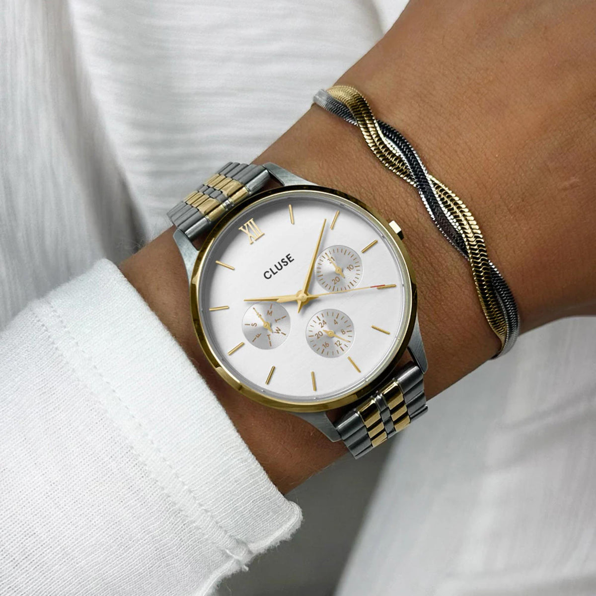 Women’s chronograph wristwatch with white dial and two-tone steel link bracelet