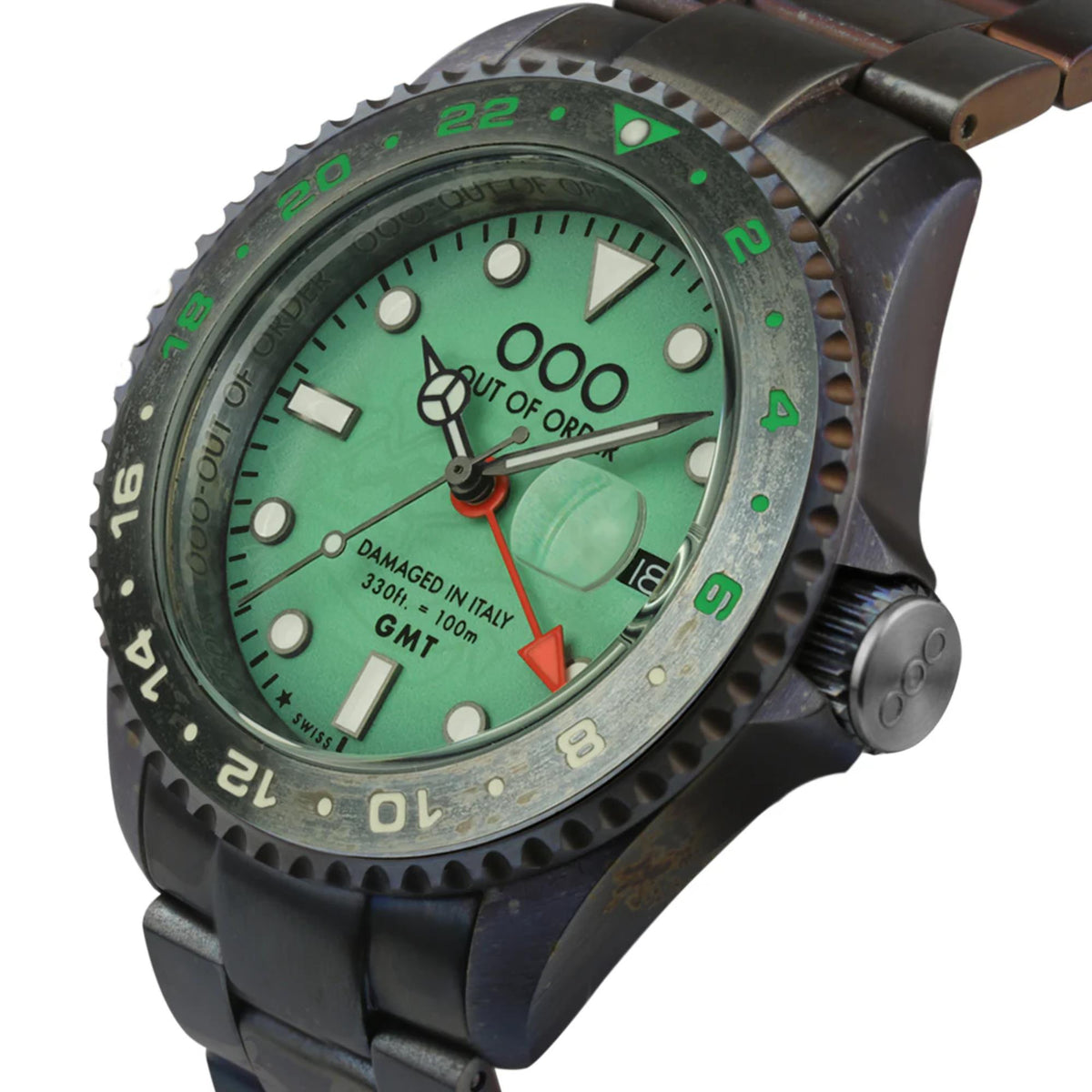 Green GMT dial men's wristwatch with distressed bezel, red seconds hand, and black steel bracelet