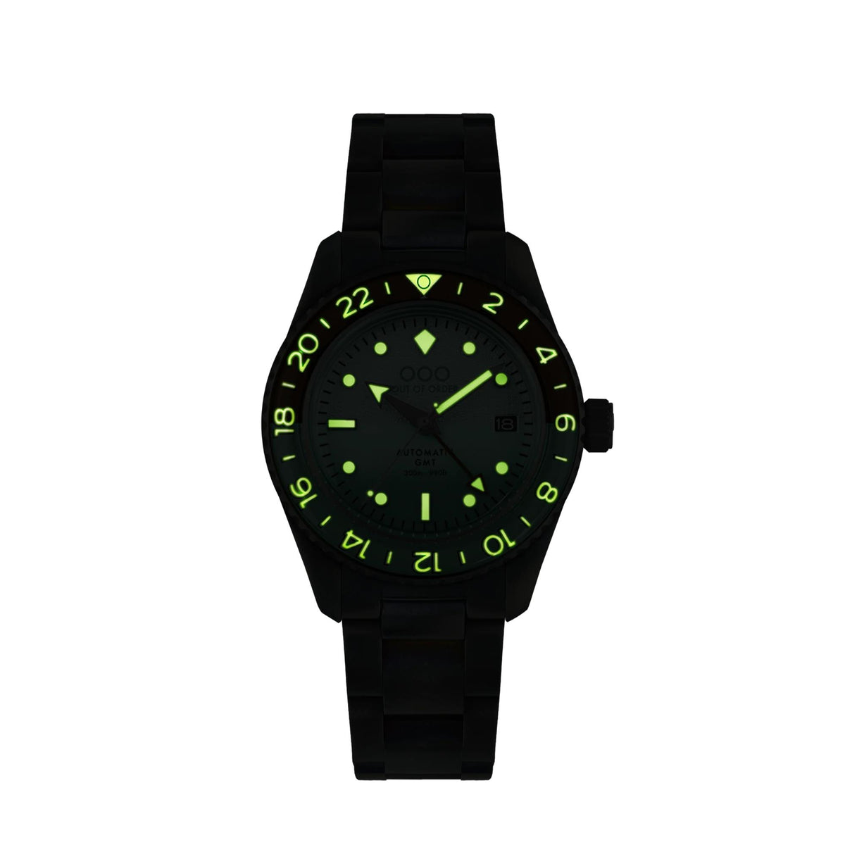 Men's automatic GMT watch with dark dial, neon-green numerals, and black silicone strap