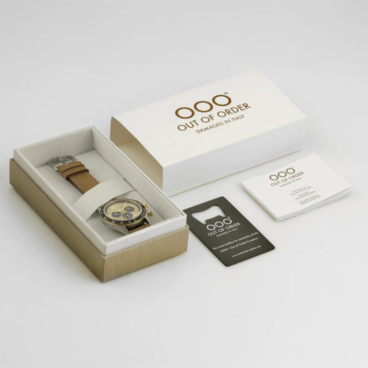 Quartz watch resting in gift box with brown leather strap and card included