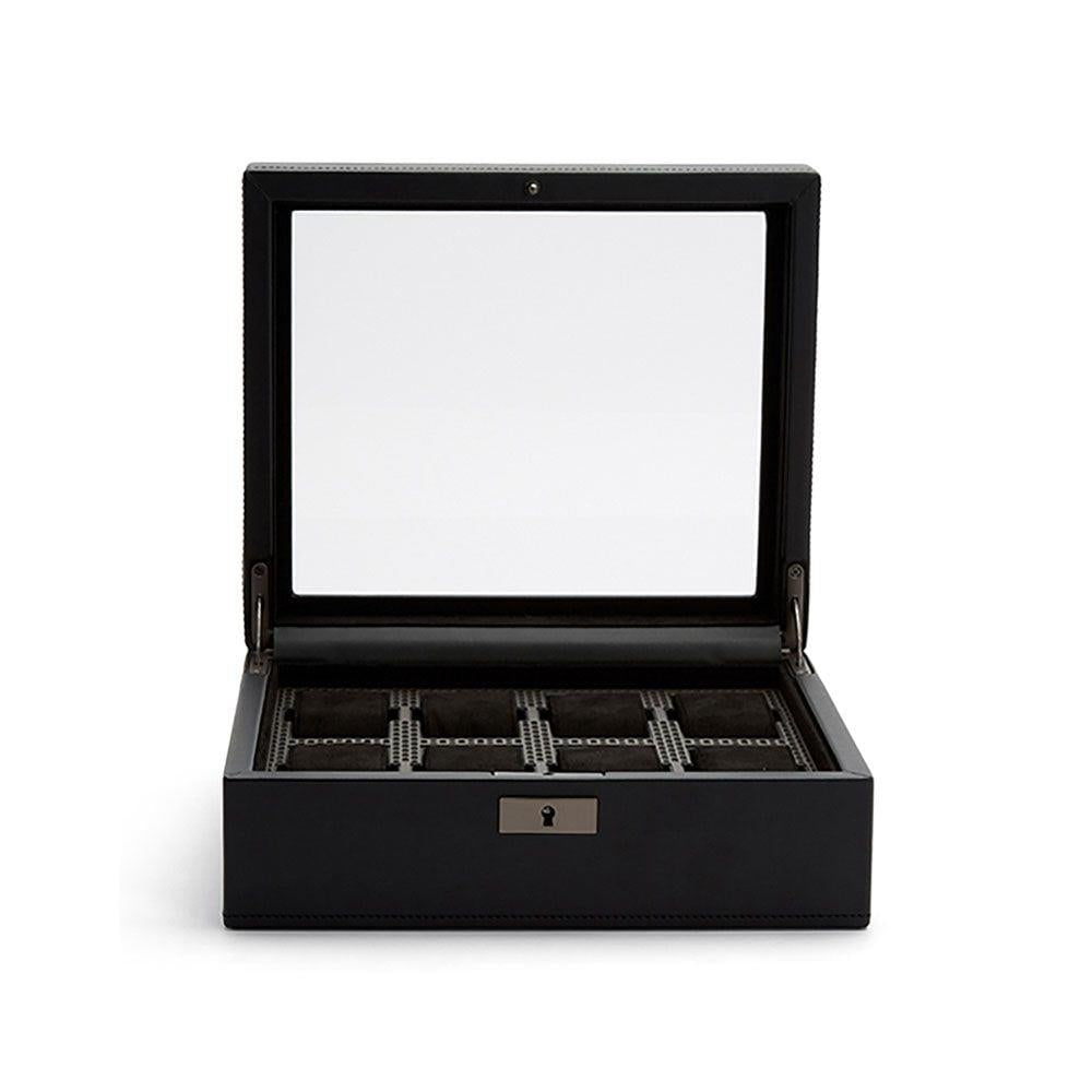 Black watch box with open lid showing organizer compartments and divider slots
