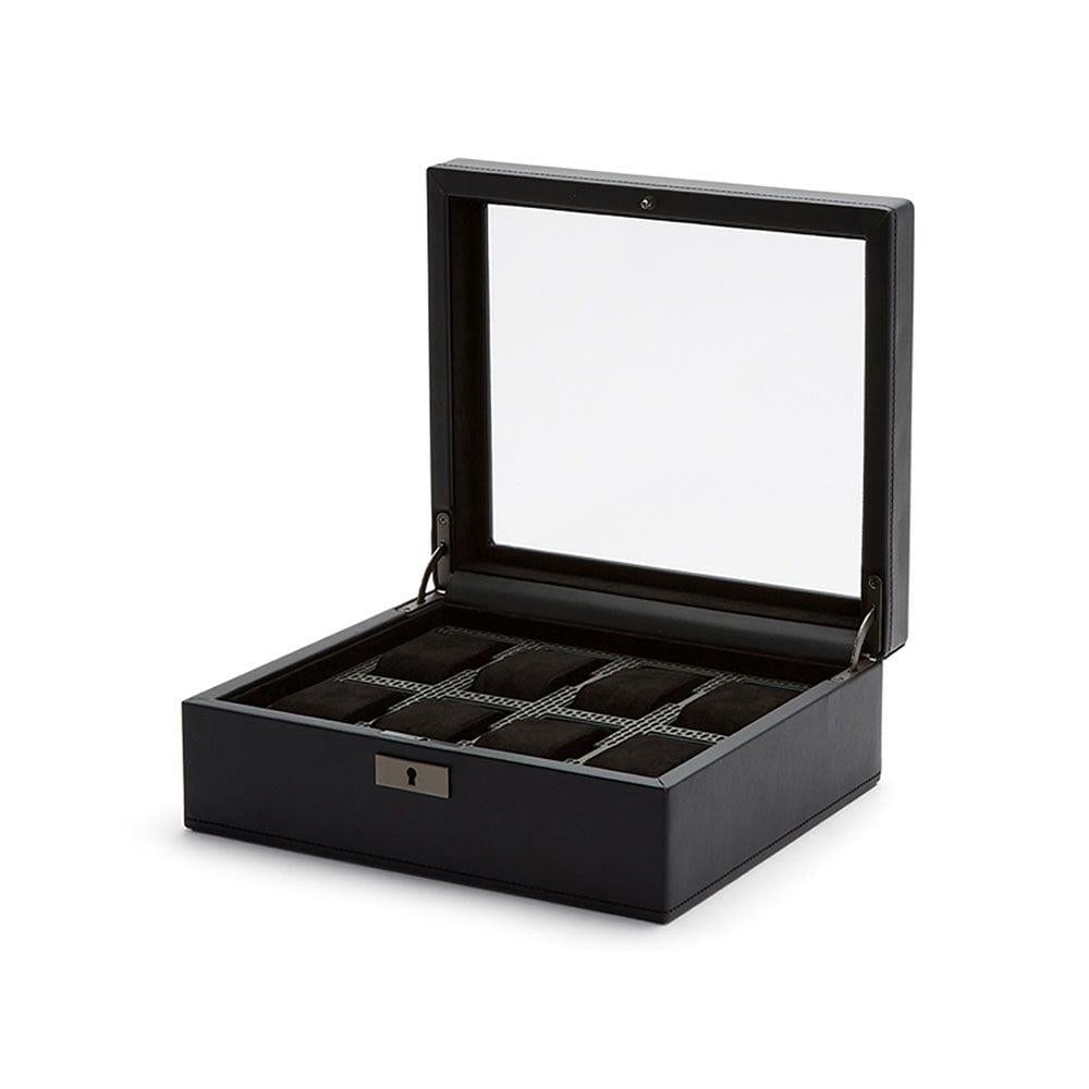 Black watch box with open hinged lid and padded inserts for watch slots