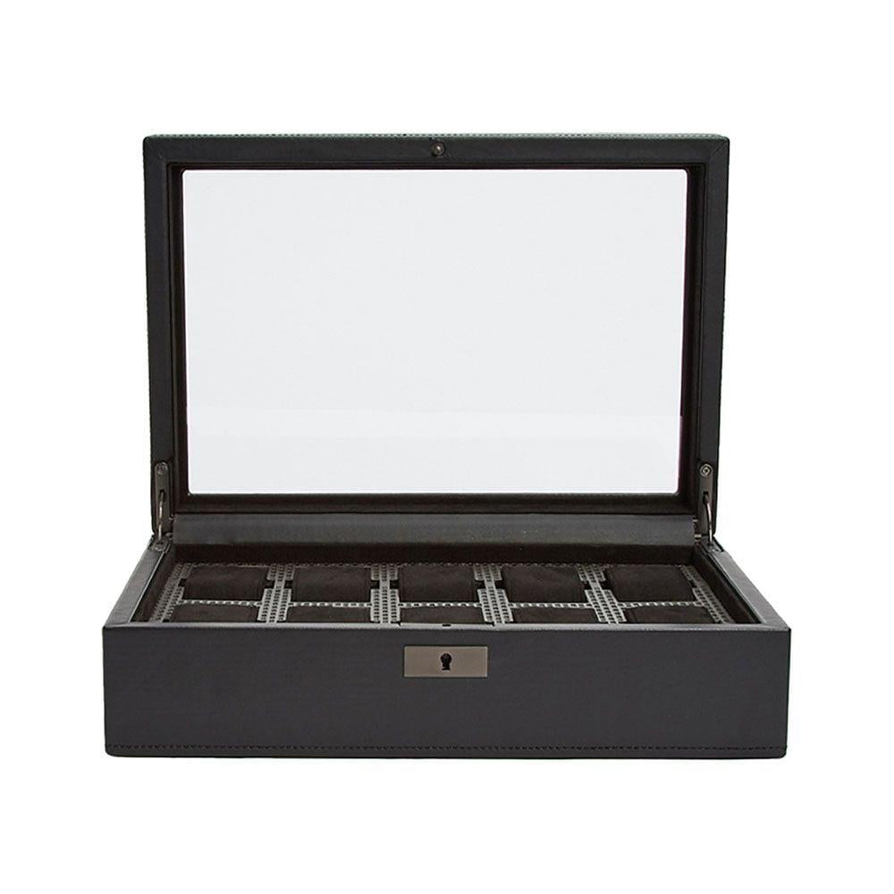Open dark watch box with hinged glass lid and felt-lined compartment inserts