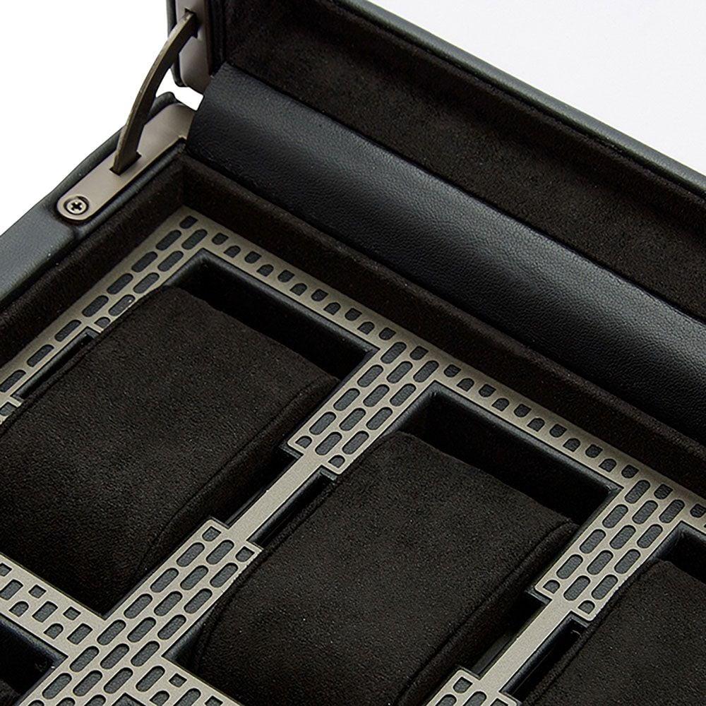 Interior watch box tray with metal grid dividers and black foam inserts