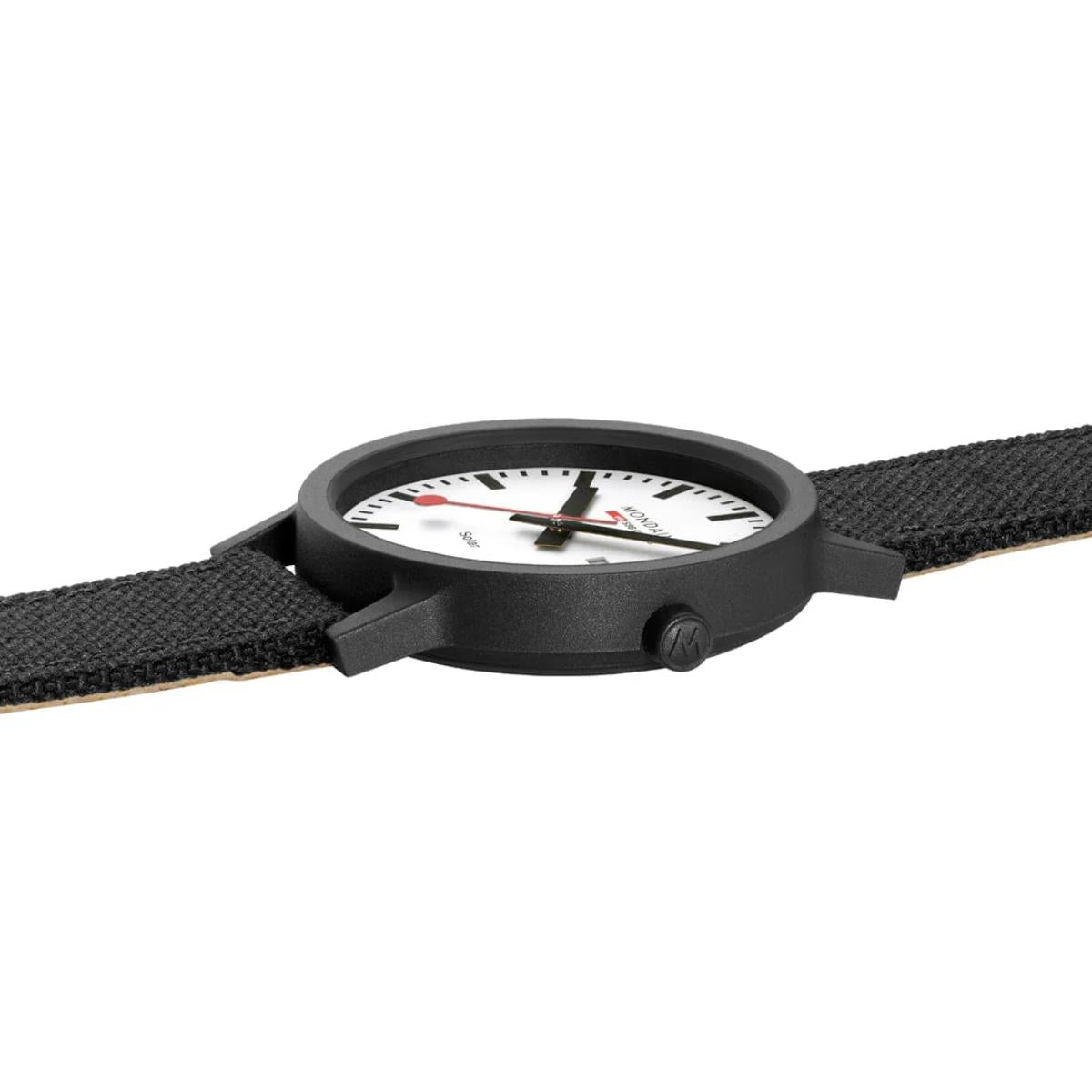 Low-profile side view of Mondaine Essence MS1.41910.LB matte black watch case and signed adjustment crown