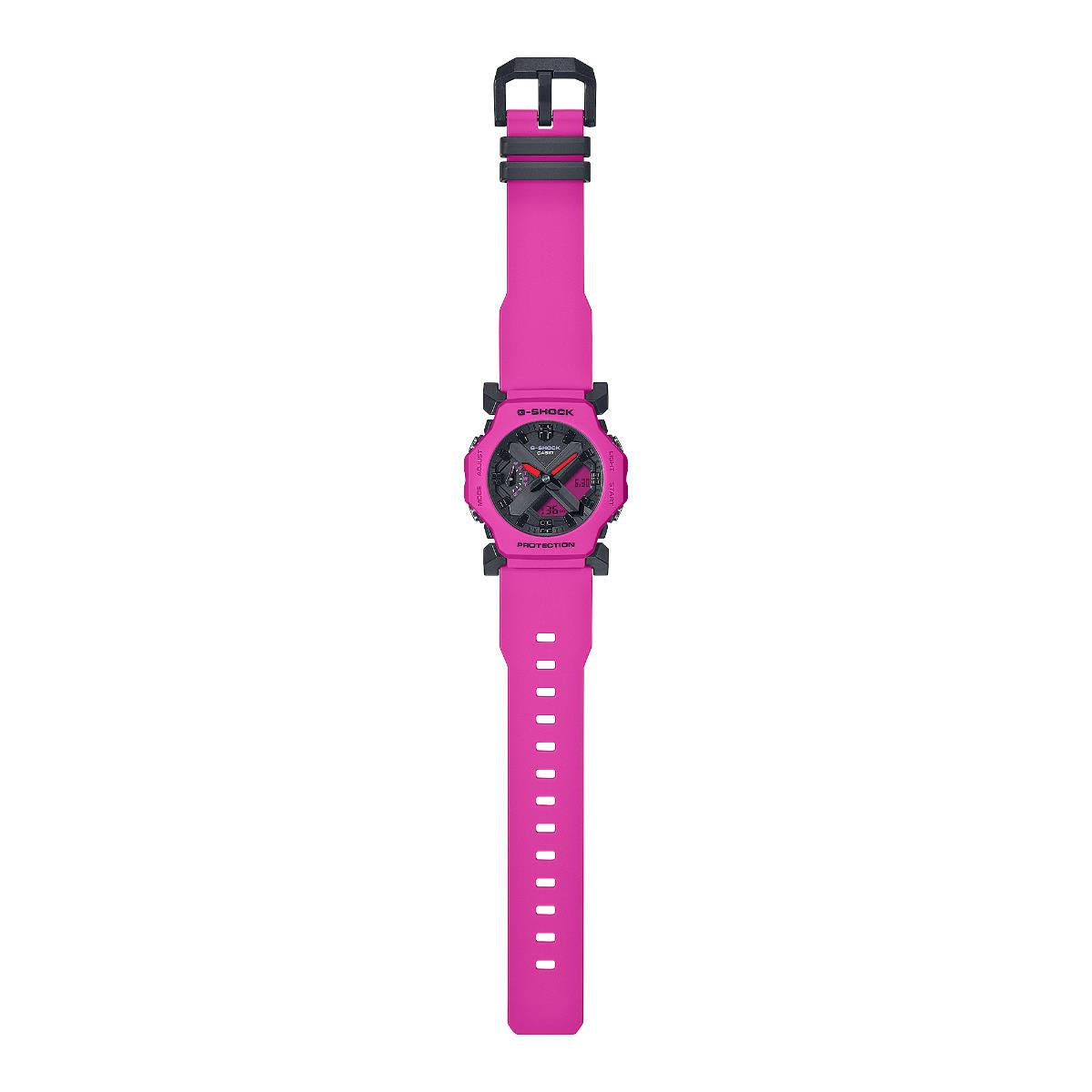 G-Shock resin strap watch with black dial and pink strap, side view