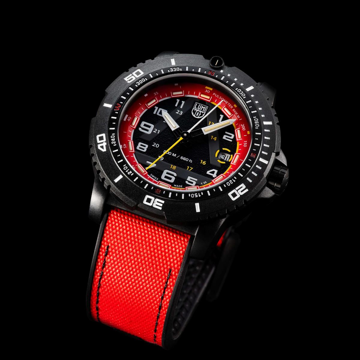 Angled view of the Luminox ICE-SAR watch showing its thick black Carbonox case, red dial ring, and textured red textile-rubber strap