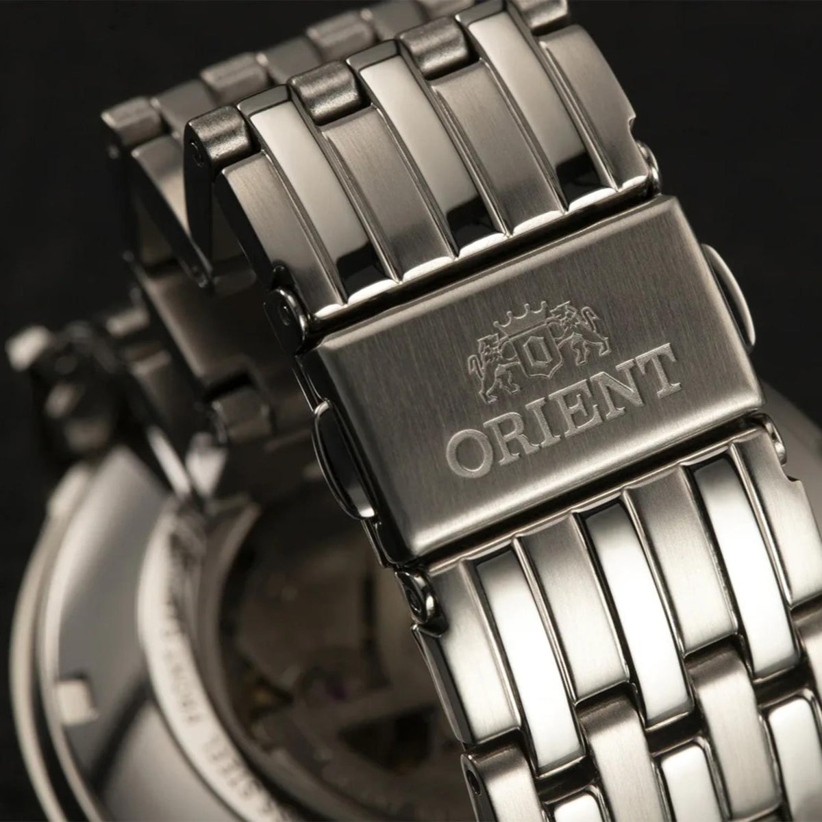 Stainless steel automatic watch with white dial and metal link bracelet, ORIENT logo