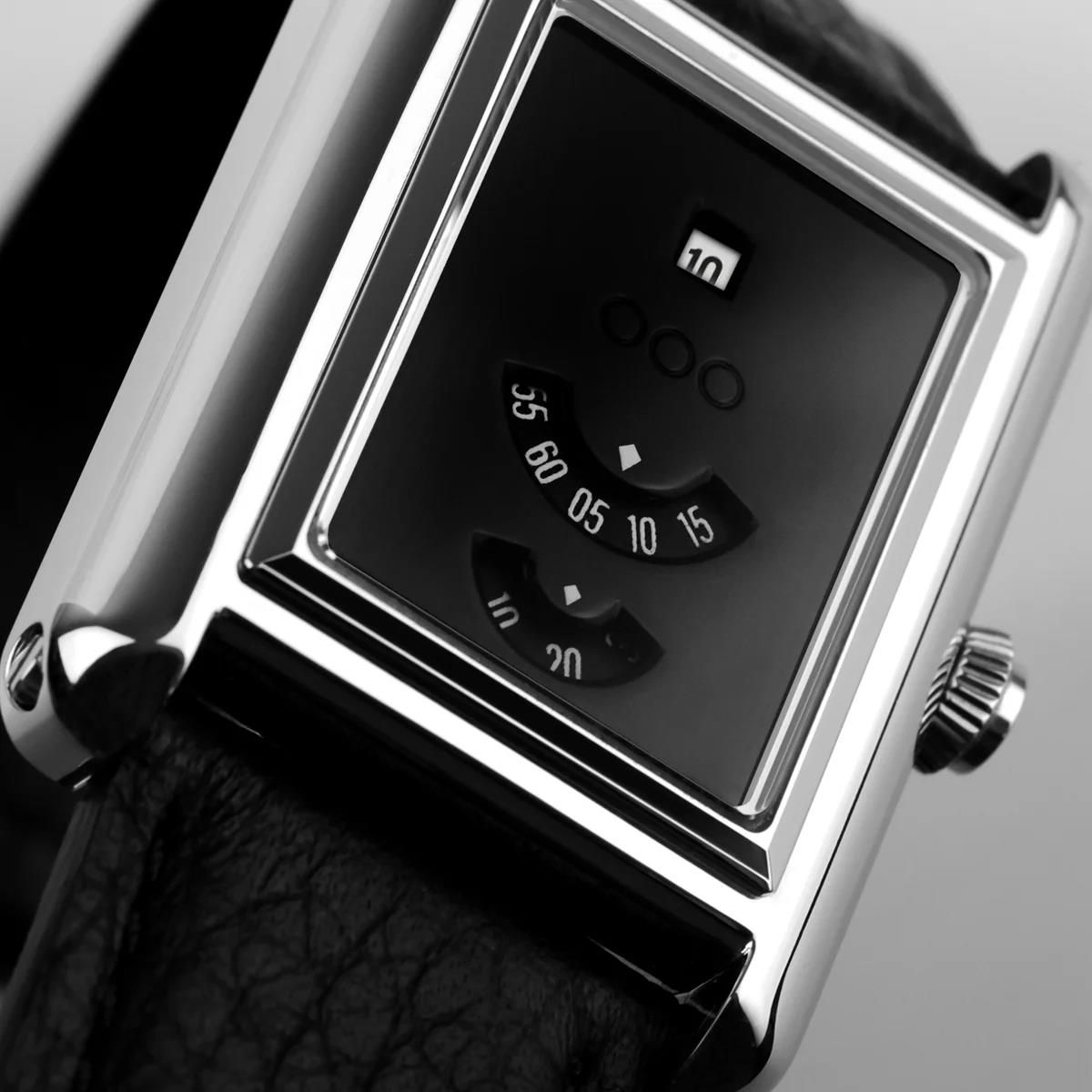 Rectangular watch with black dial, silver-tone case, right-side crown, black leather strap