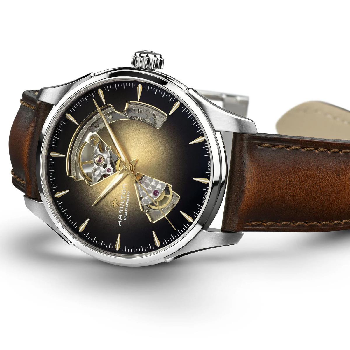 Hamilton Jazzmaster H32675501 open heart dress watch angled side perspective featuring polished steel case, textured black dial, and brown strap