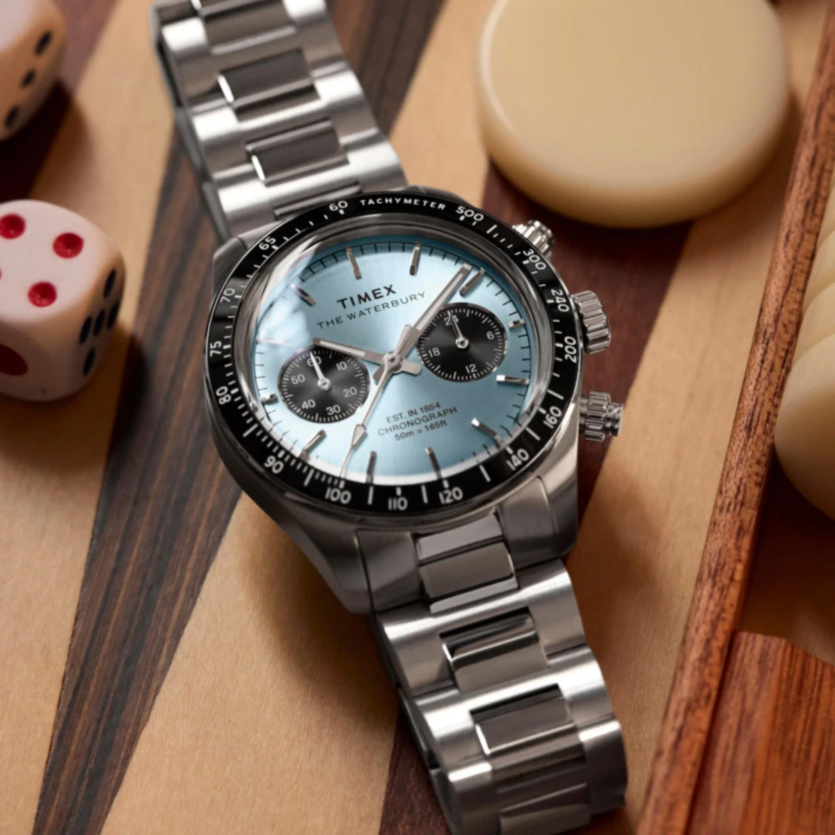 Stainless steel chronograph watch with dark blue dial and black bezel