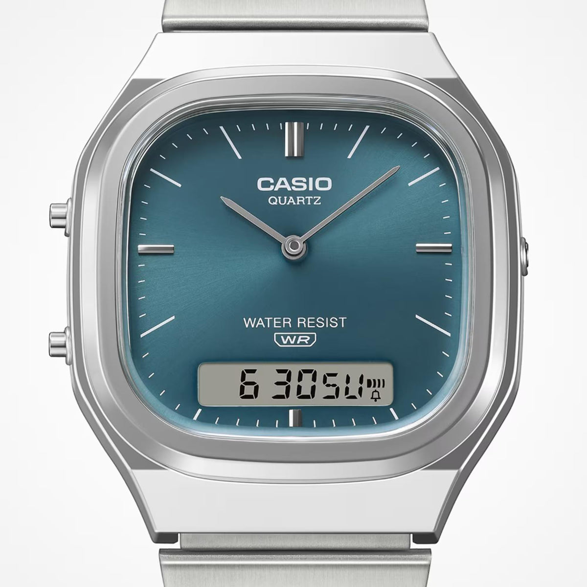 Casio square watch with teal dial, analog hands, and digital time display, steel case