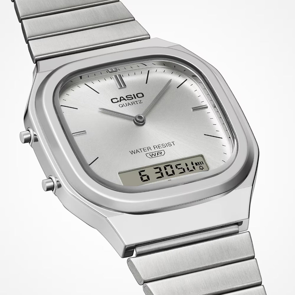 Silver Casio quartz watch with light dial, analog hands, and digital 6:30:50 display