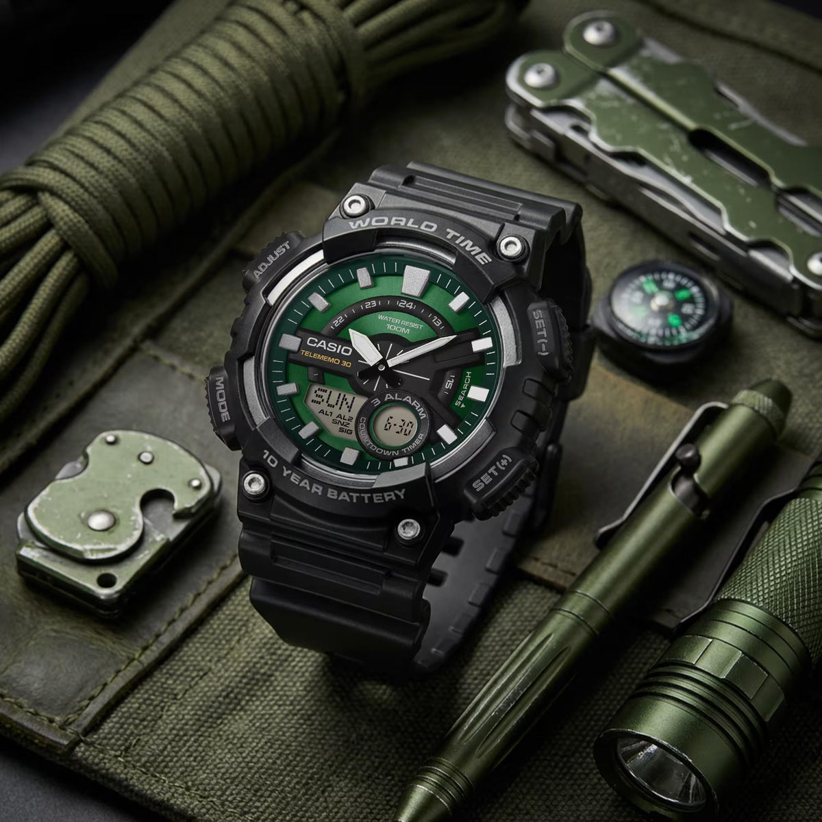 Casio Green Face Series AEQ-110W-3A2VEF rugged resin case styled with flashlight and multi-tool