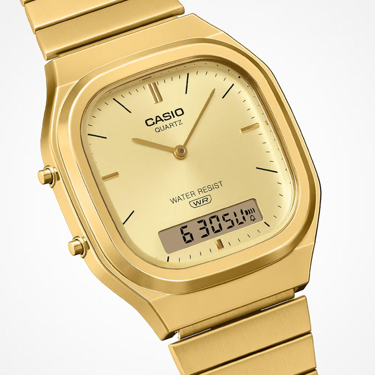 Casio Vintage AQ-240EG-9AEF gold steel case and dual time digital-analog window detail