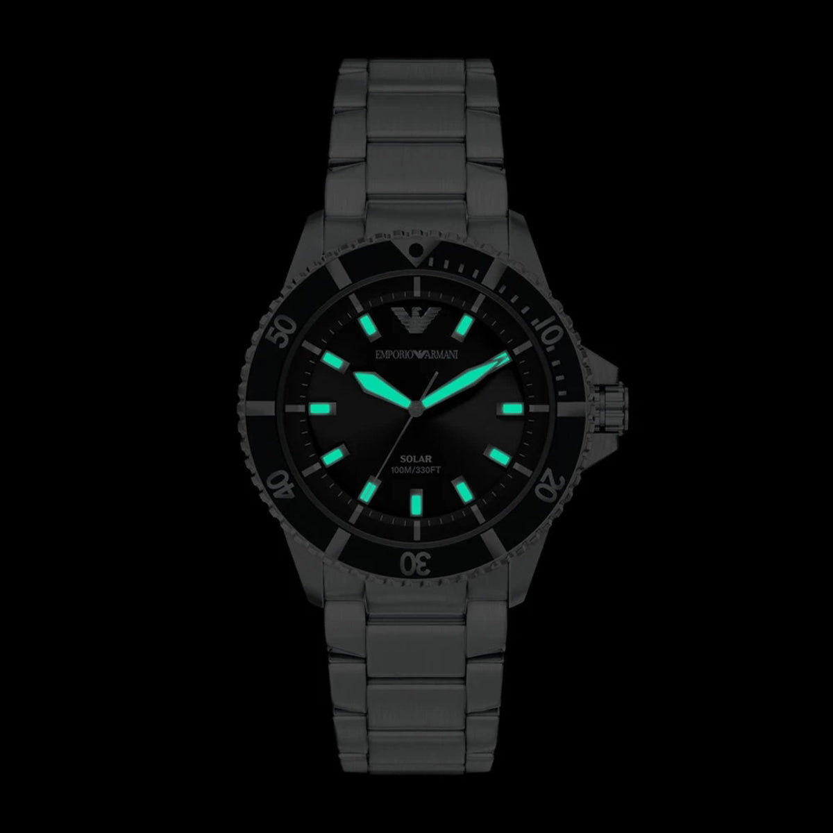 Dark view displaying glowing luminescent hands and index hour markers on the Emporio Armani World Explorer AR11787 timepiece