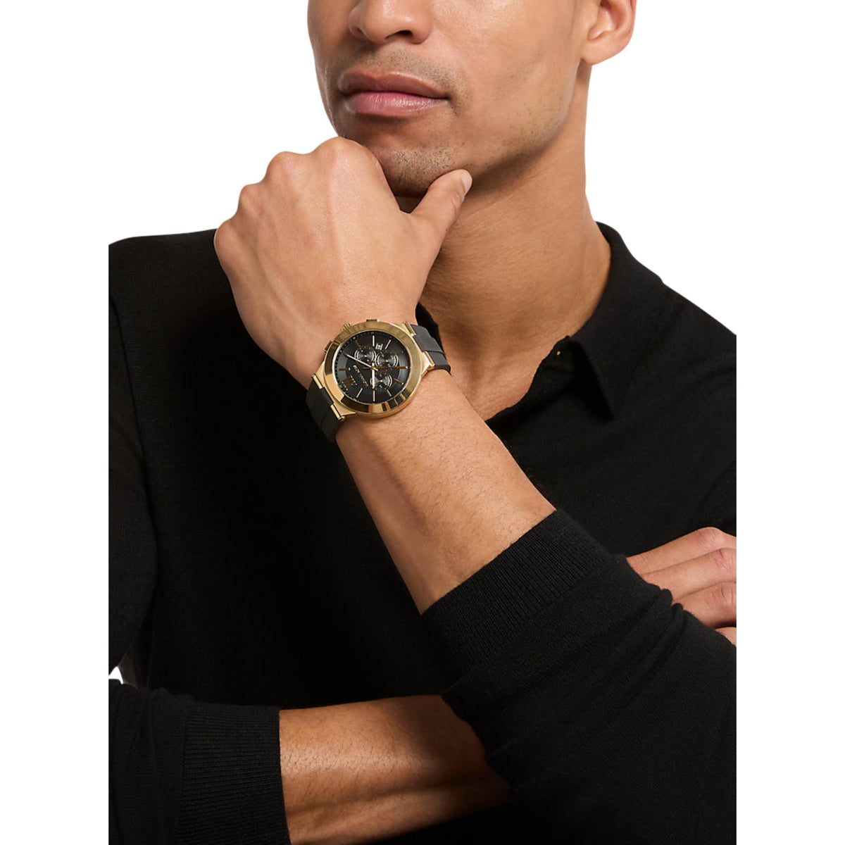 Men's chronograph watch on model wrist, black dial and black silicone band