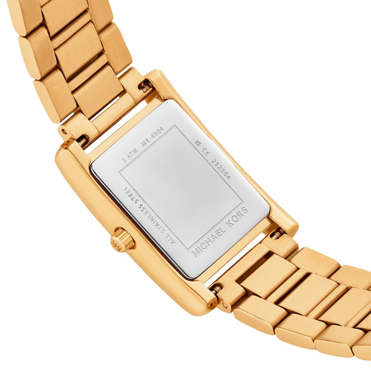Michael Kors Essex MK4904 rear view showcasing the engraved stainless steel case back and gold-tone bracelet attachment