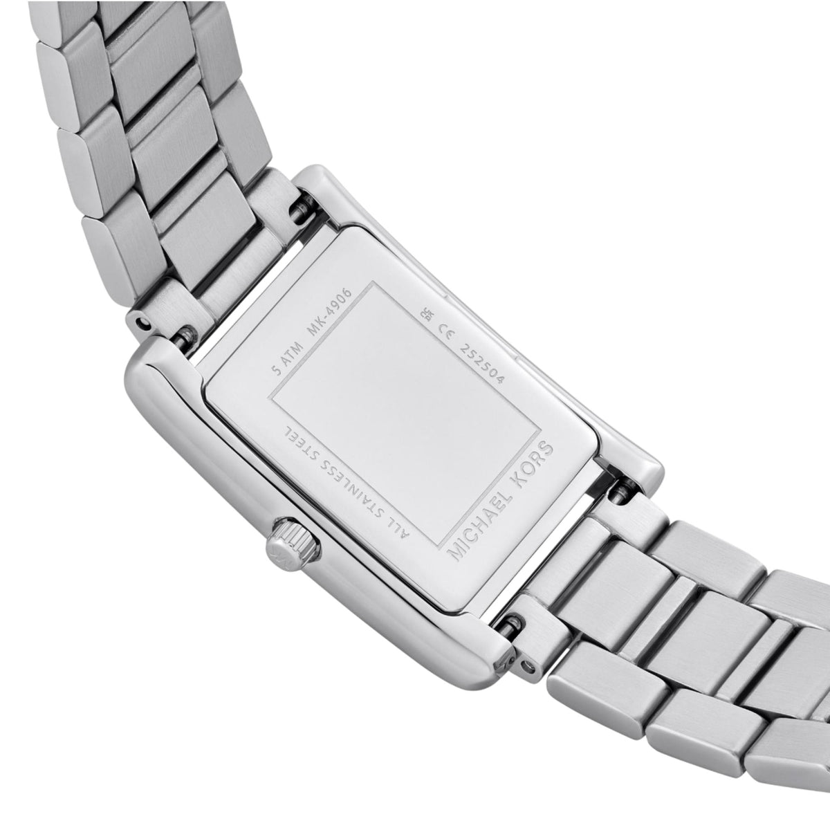 Michael Kors Essex MK4906 rear view showcasing the engraved stainless steel case back and metal bracelet attachment