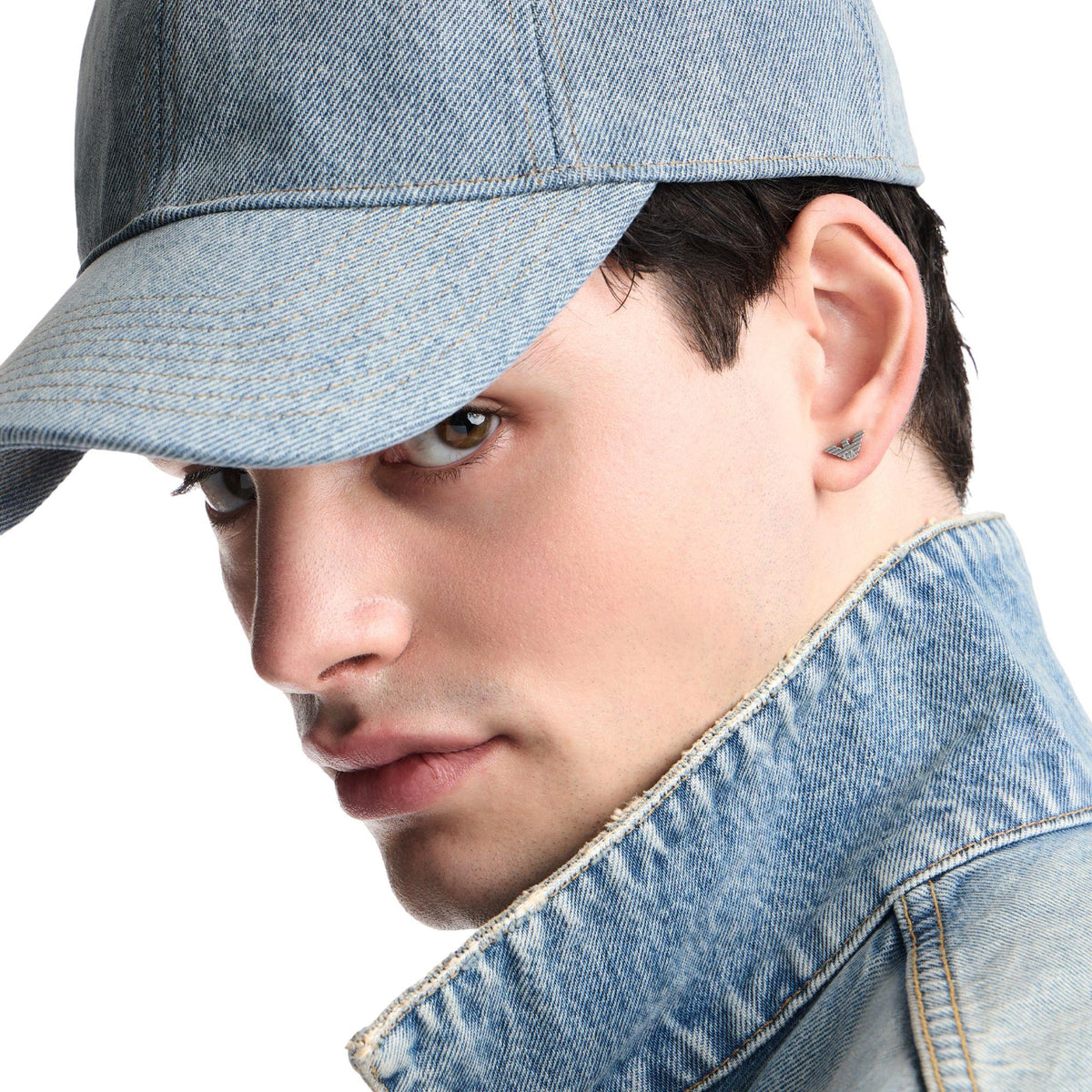 Model wearing Emporio Armani mens stainless steel eagle stud earring EGS3318040