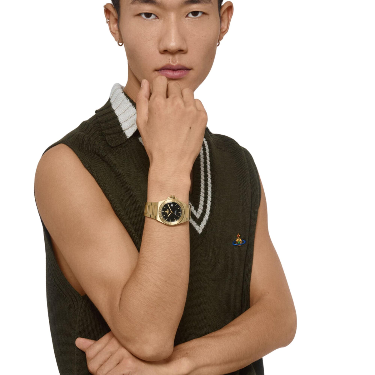Gold-tone steel wrist watch with dark face and bold hour markers