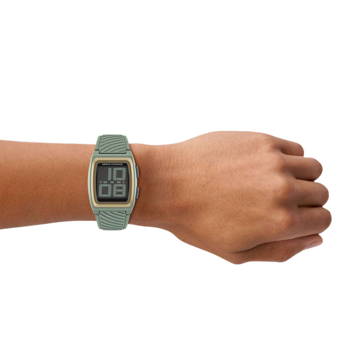 Green silicone digital quartz watch on wrist, LCD display with dark readout