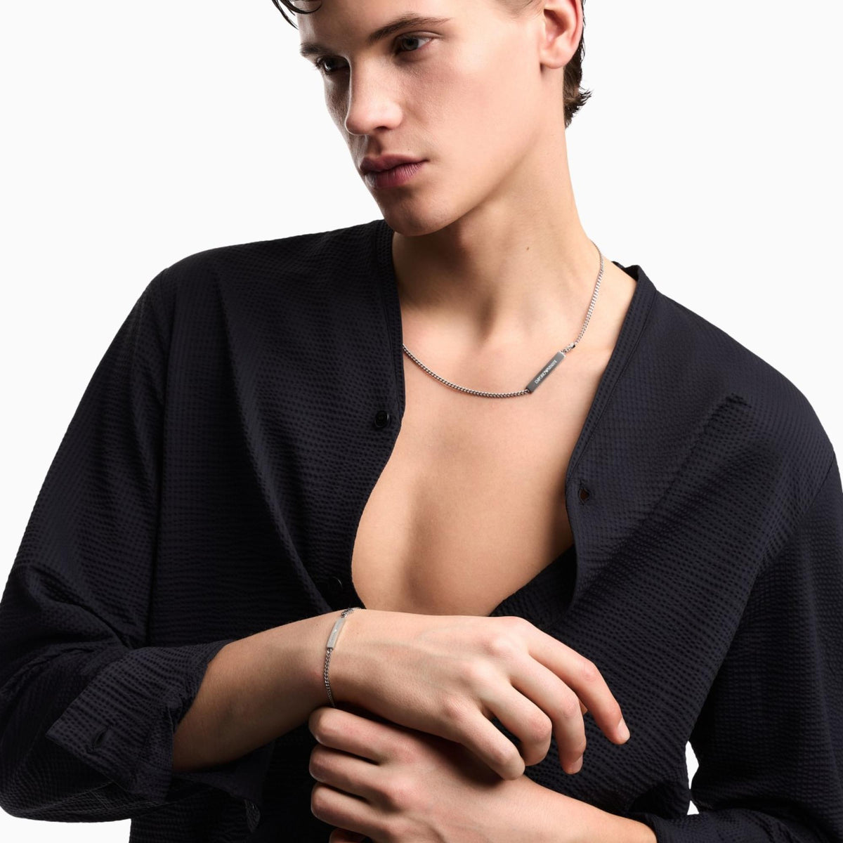 Model wearing Emporio Armani mens chain link ID bracelet EGS3310040