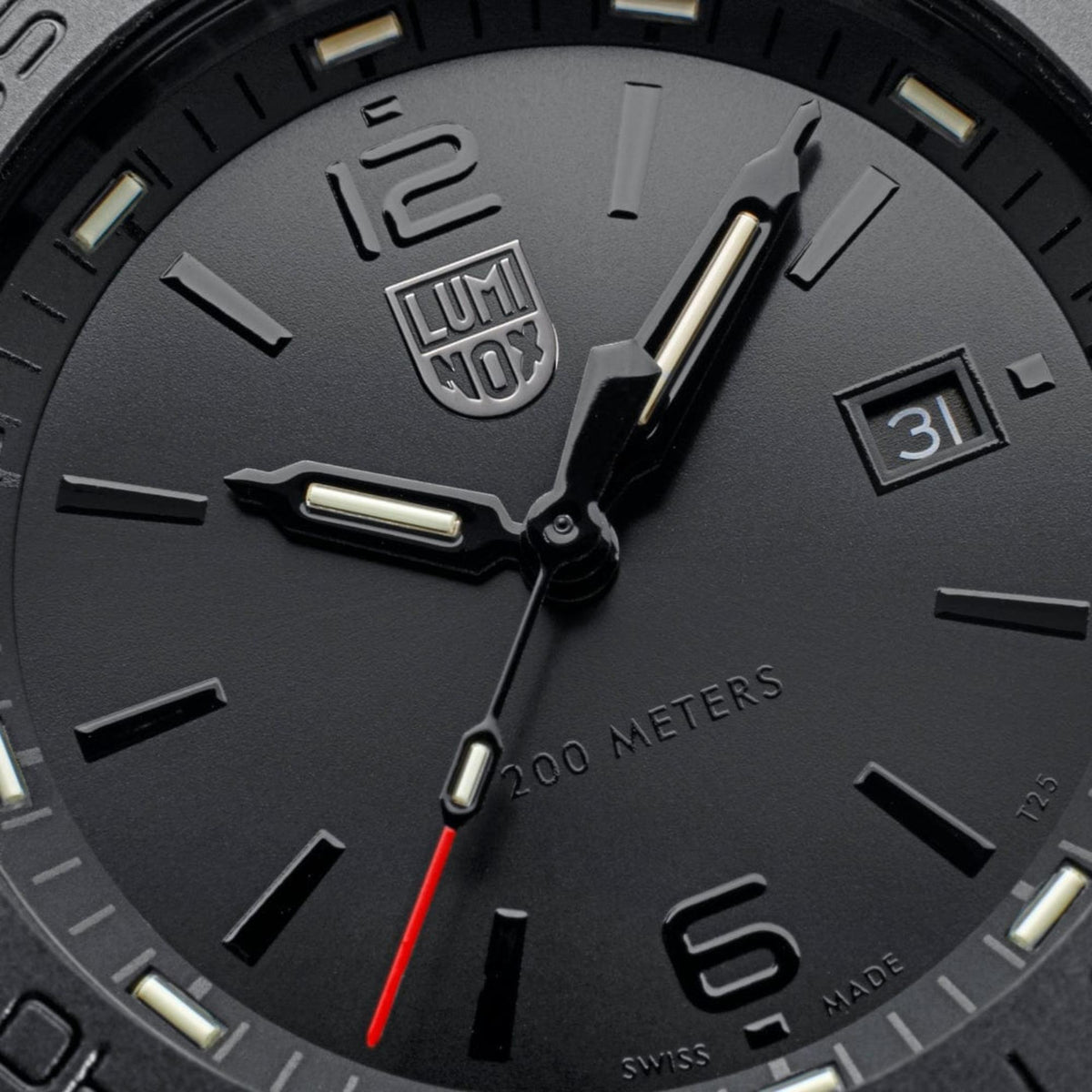 Luminox black dial close-up with lume markers and 31 date window
