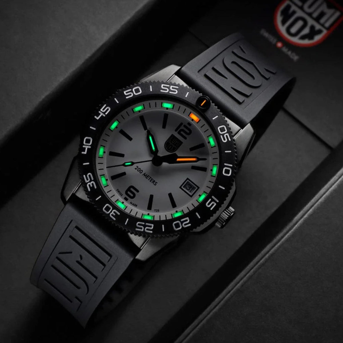 Luminox Pacific Diver XS.3127M presented in a dark display box with illuminated tritium hands