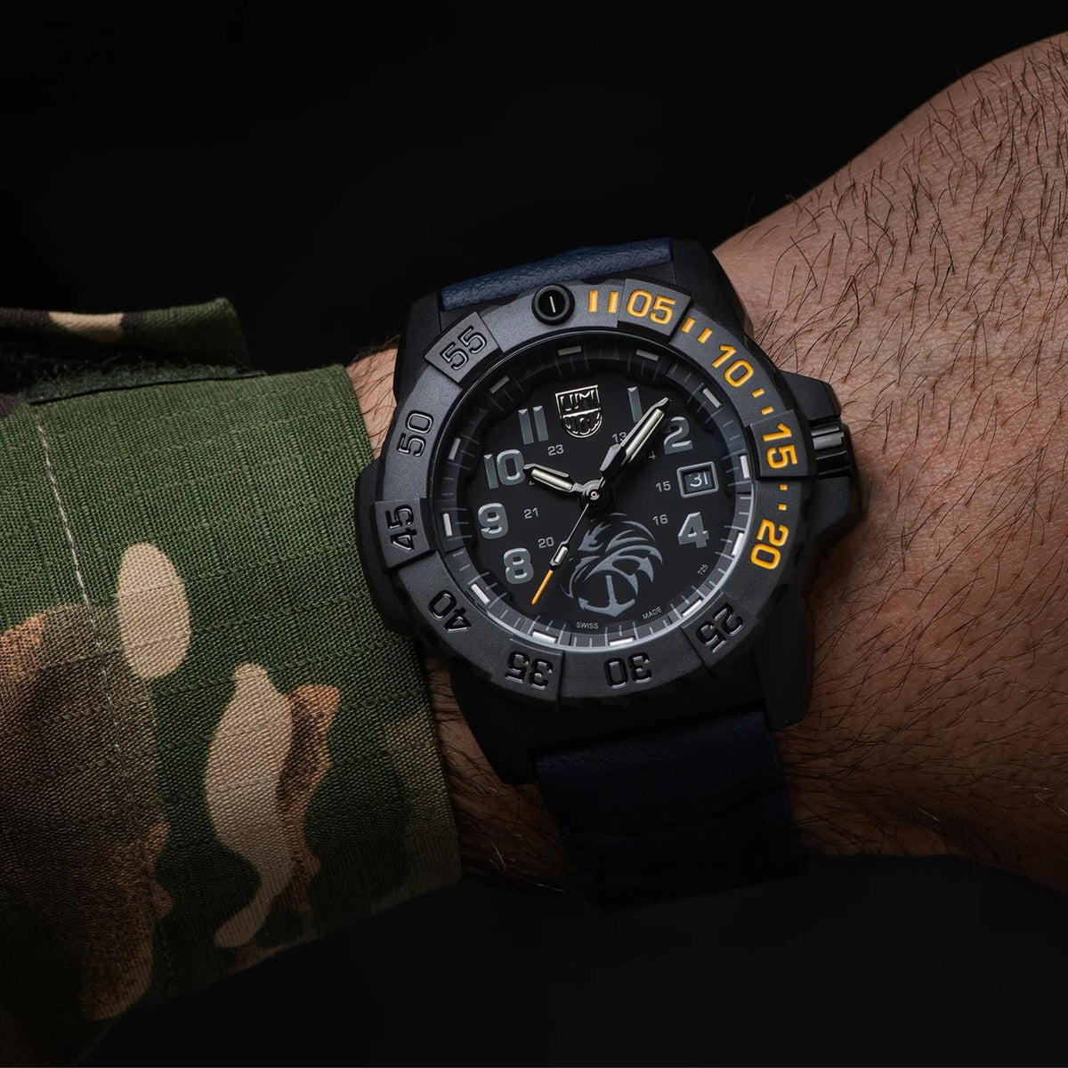 Luminox Navy Seal XS.3505.NSF.N on-wrist view with camouflage jacket sleeve