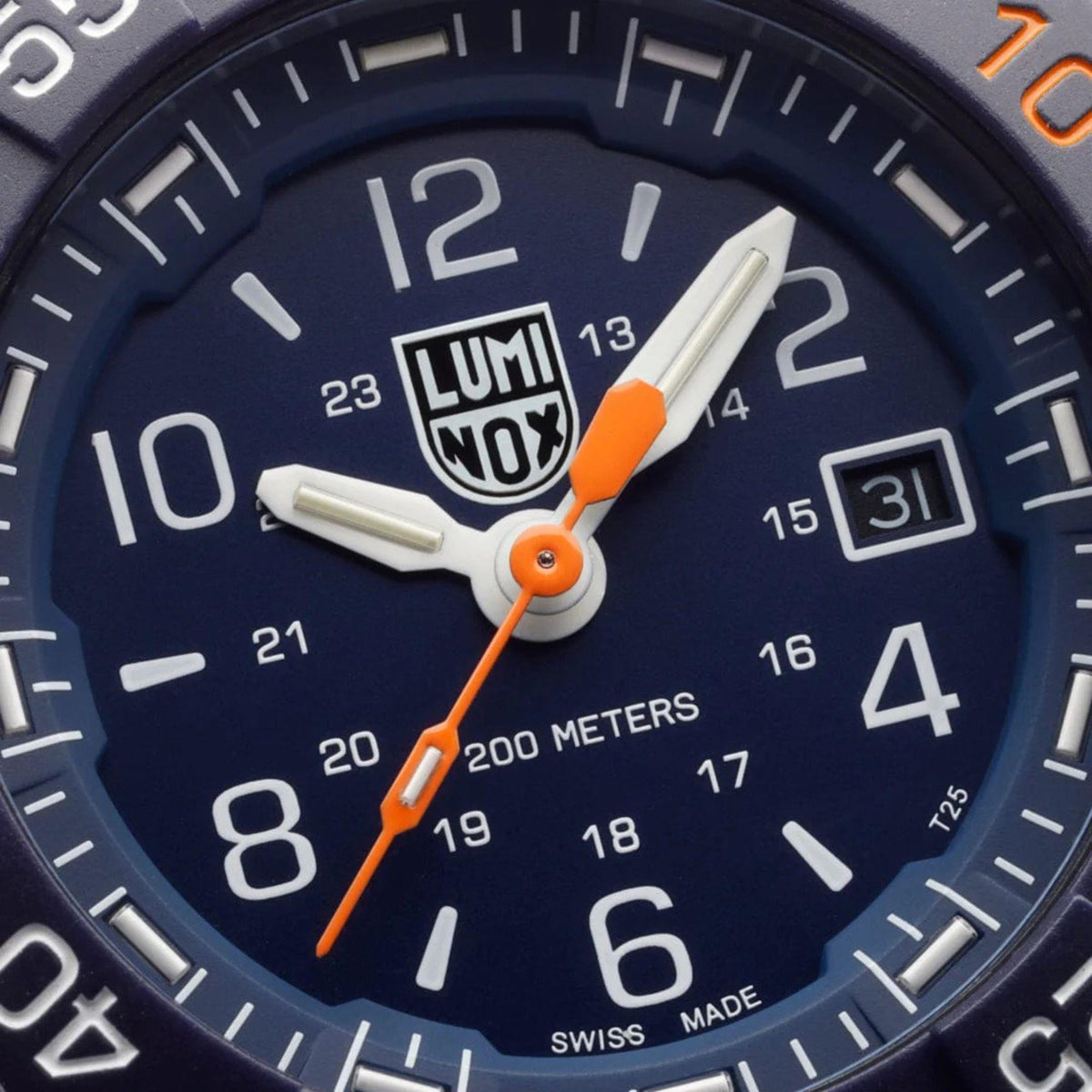 Close-up of the blue watch face, orange second hand, date display, and logo on the Luminox Navy SEAL XS.3253.CB.NSF.2