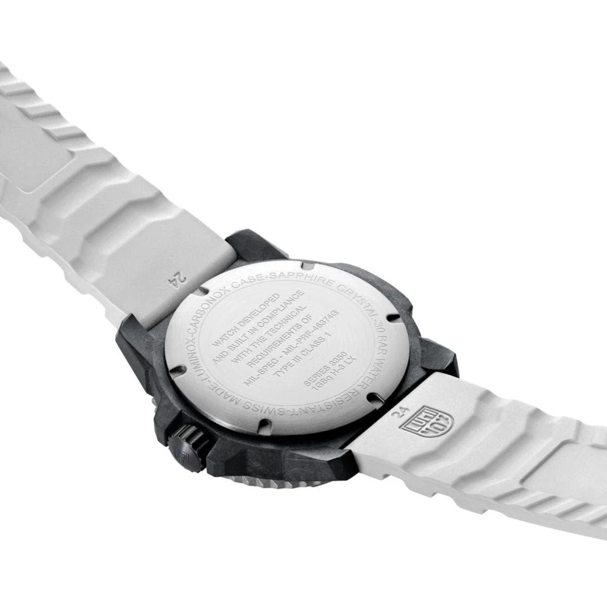 Luminox MIL-SPEC watch caseback on white rubber strap with engraved back plate