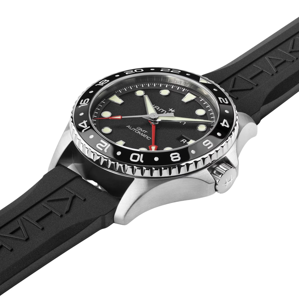 Men's black dial automatic GMT diver watch with steel case and black rubber strap, side view