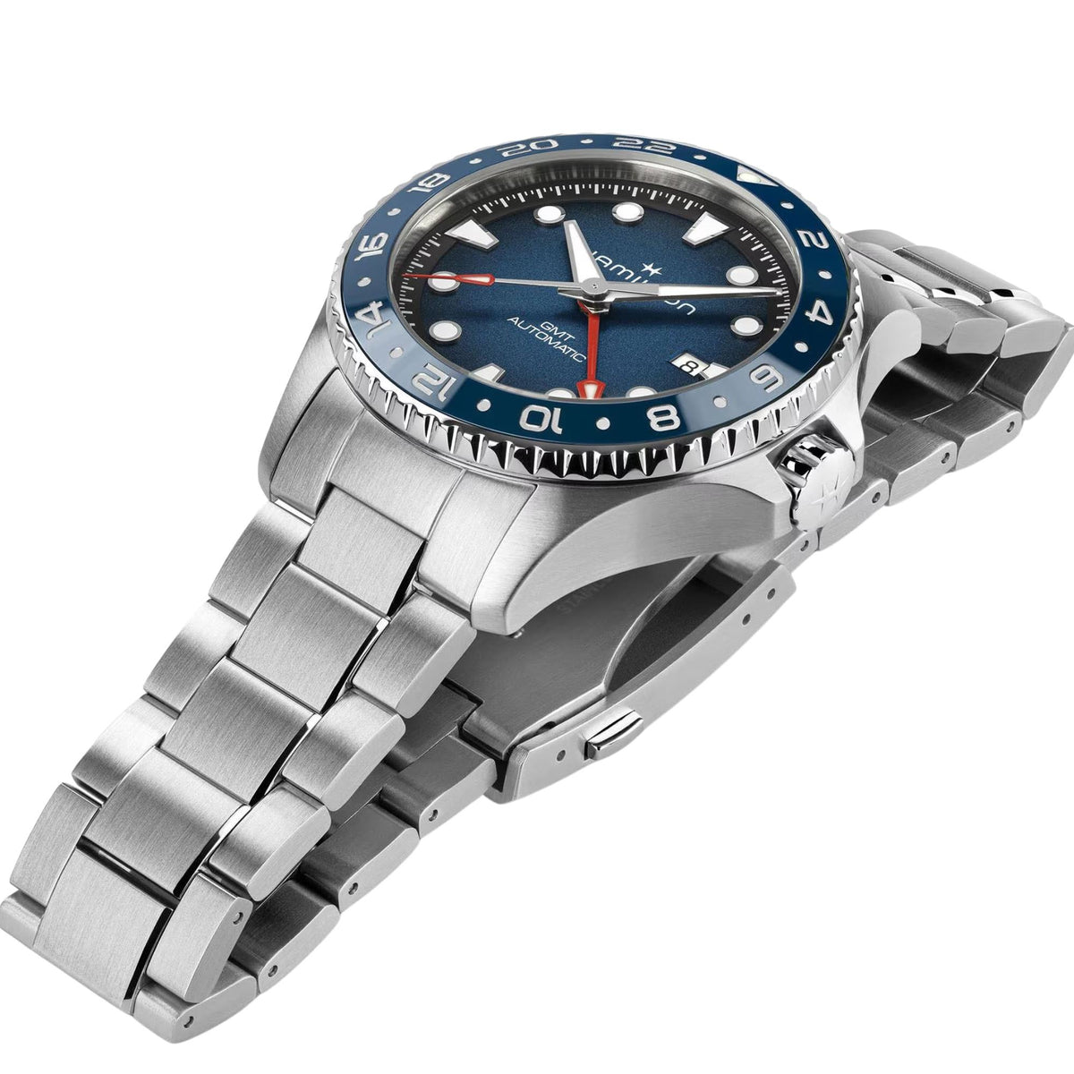 Men's stainless-steel GMT watch with blue dial, ridged bezel, and three-link bracelet