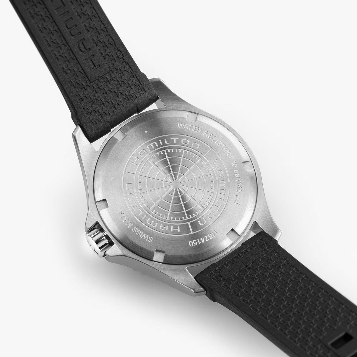 Hamilton Khaki Navy Scuba H82415330 40mm watch rear view showing solid engraved stainless steel case back and black rubber strap undersides