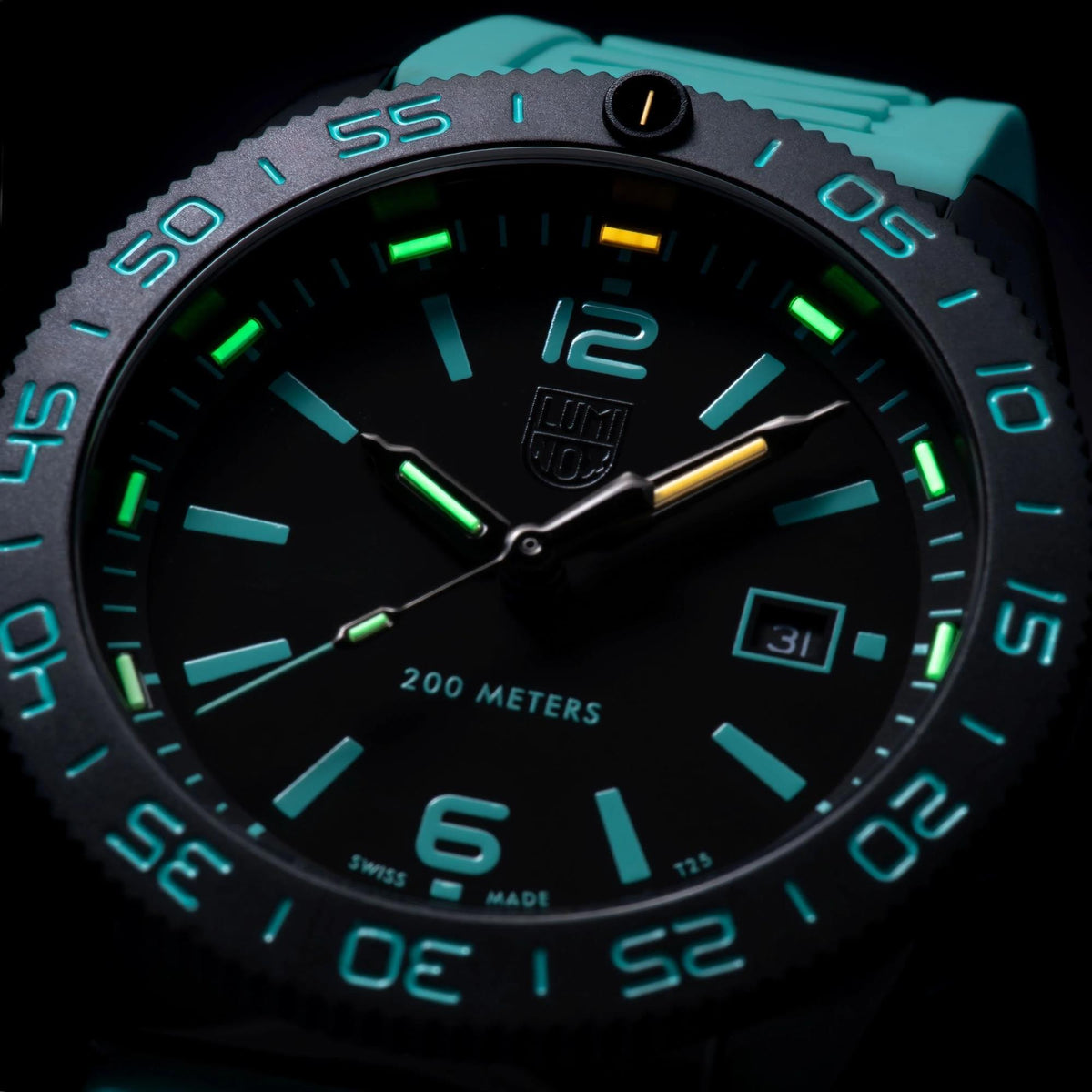 Close-up oof the dark watch face, luminescent hands, date display, and mint indices on the Luminox Pacific Diver XS.3124.N.SET
