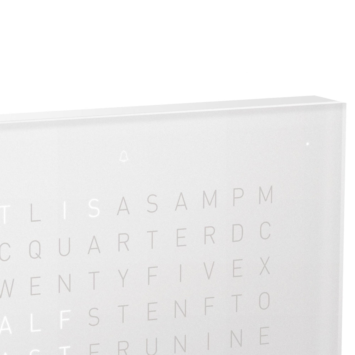 White QLOCKTWO table clock close-up of raised letter time grid on front display