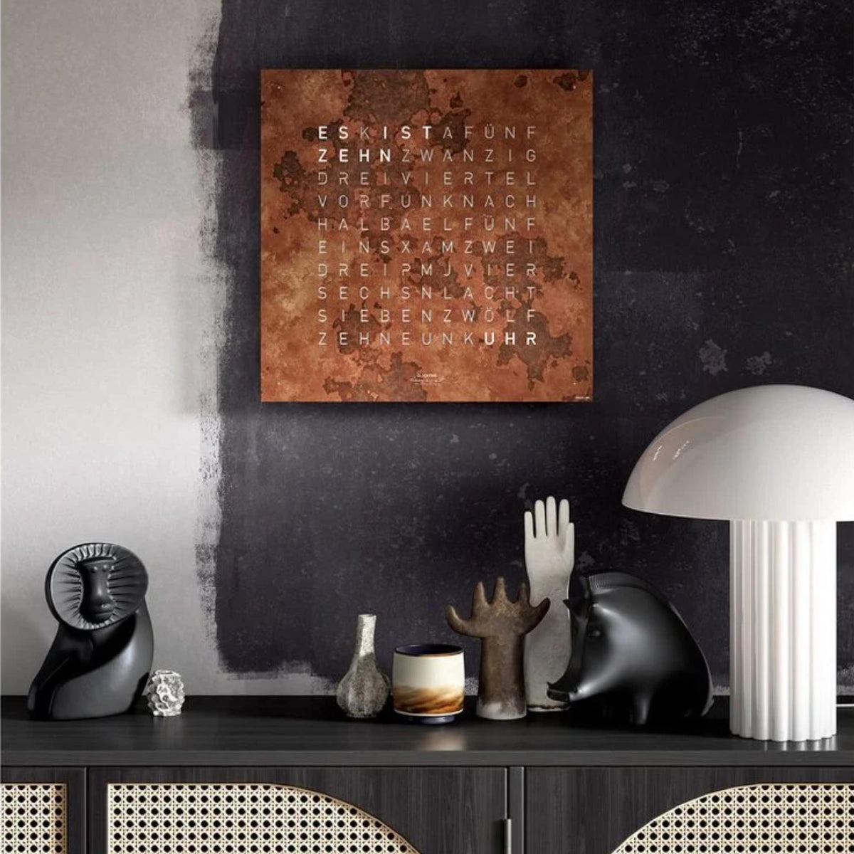 Rust QLOCKTWO word-clock face on square copper panel with English time text
