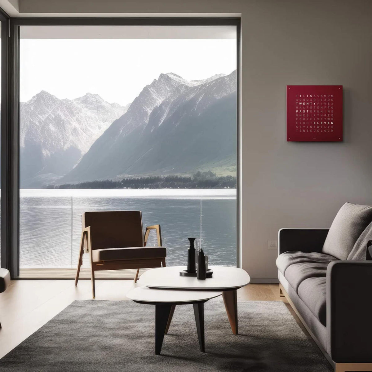 Red velvet wall clock with English word grid mounted on an interior wall