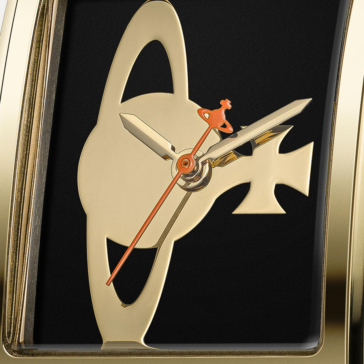Close-up of black watch dial with gold horse silhouette and orange hands