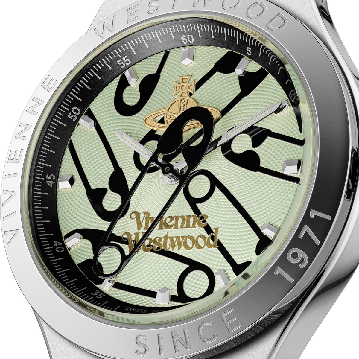 Close-up of stainless steel quartz watch dial with green patterned face and hands