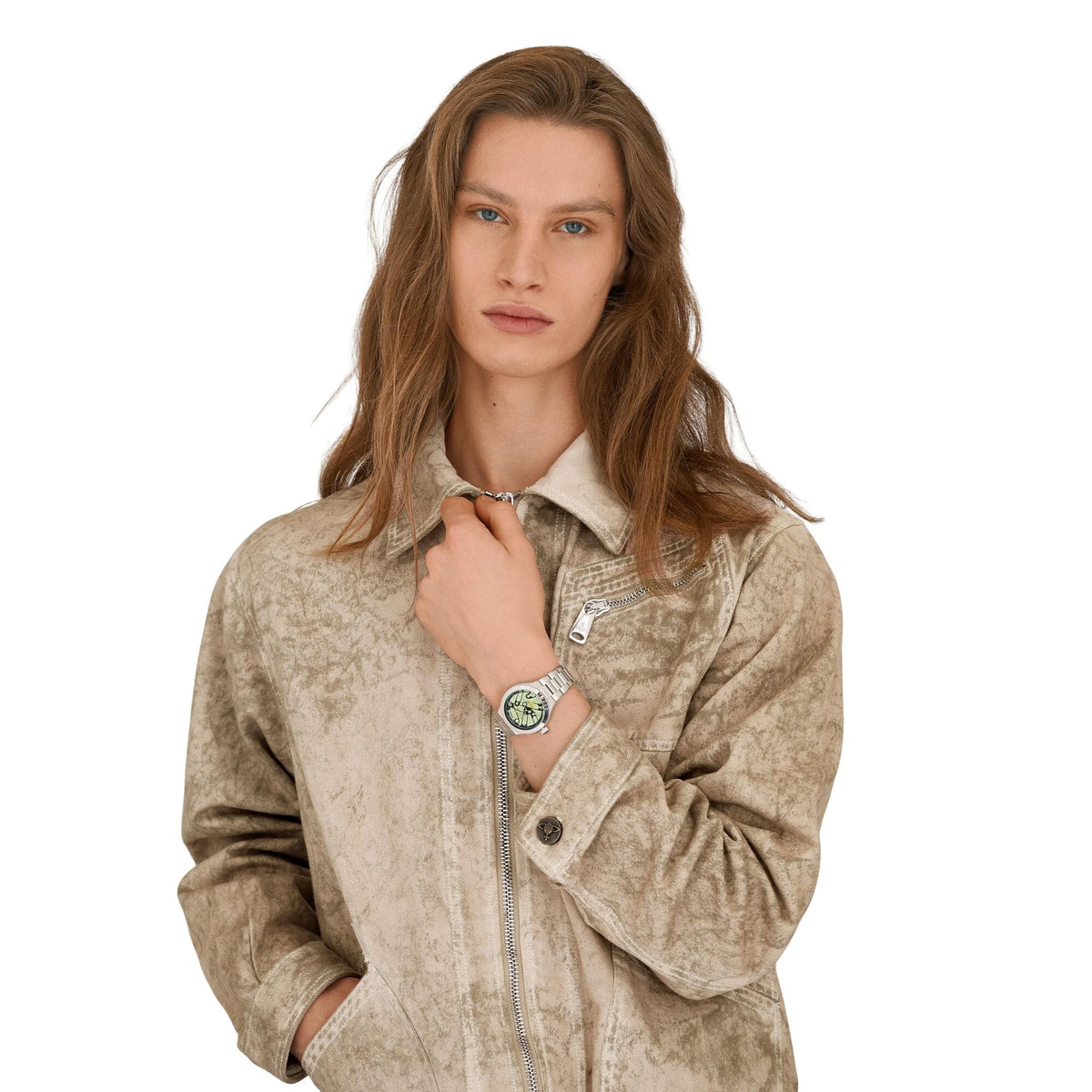 Stainless steel quartz watch on model’s wrist with green patterned dial