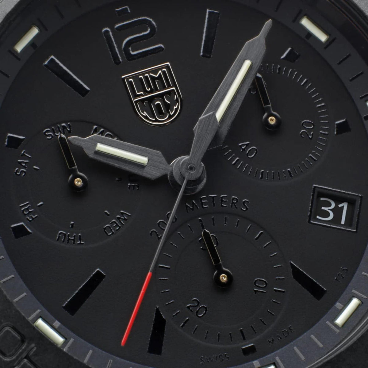 Close-up of sub-dials, date window, and red seconds hand on Luminox Pacific Diver XS.3141.BO.1
