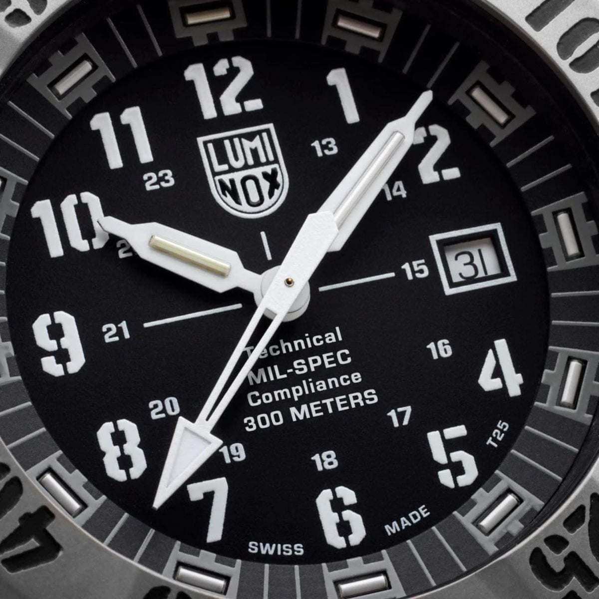 Close-up detail of the black dial, white stencil numerals, and military compliance markings on the Luminox MIL-SPEC XL.3351.2