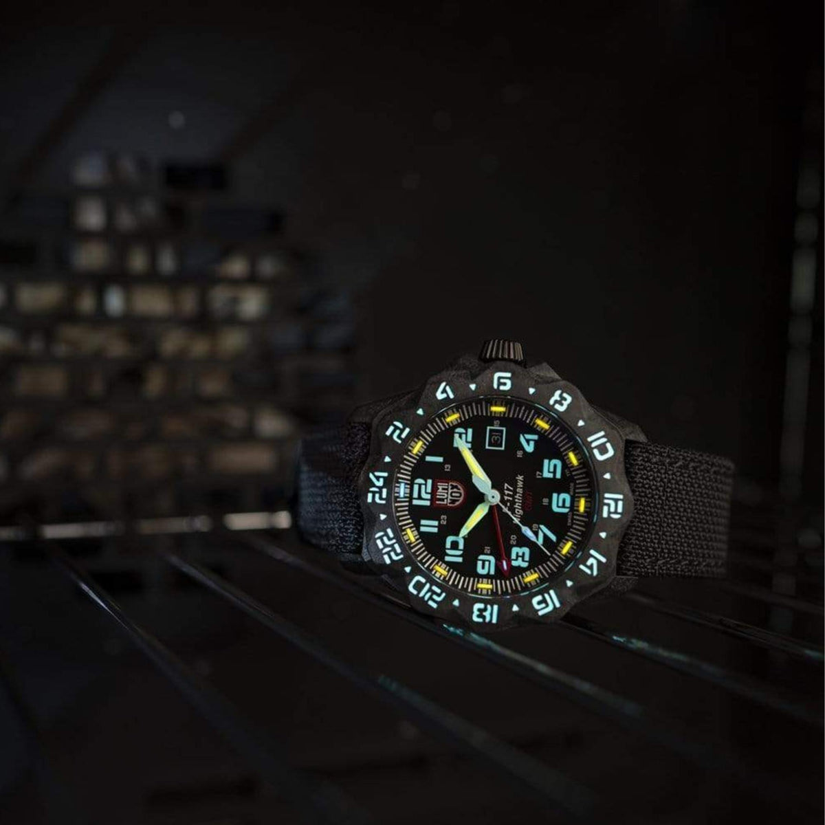 Black dial Luminox quartz watch with luminous green hands and black fabric strap