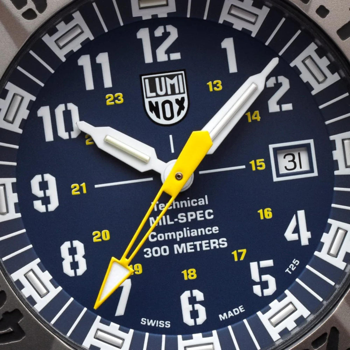 Close-up of men's blue dial quartz watch with date window and yellow-accent hands.