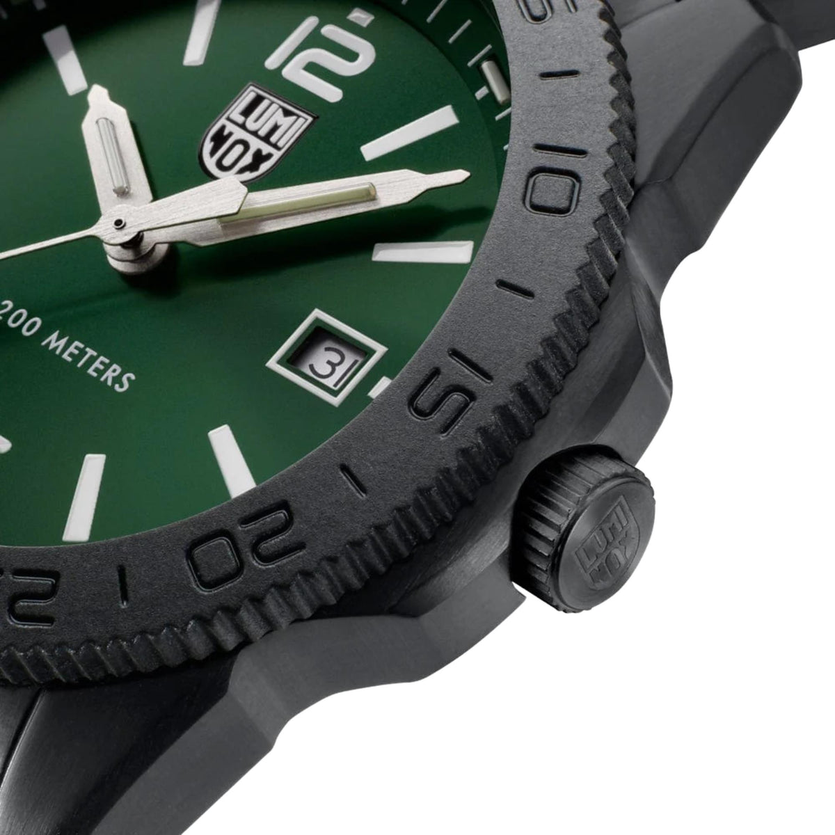 Angle of textured black CARBONOX bezel and screw-in crown on Luminox Pacific Diver XS.3137.B