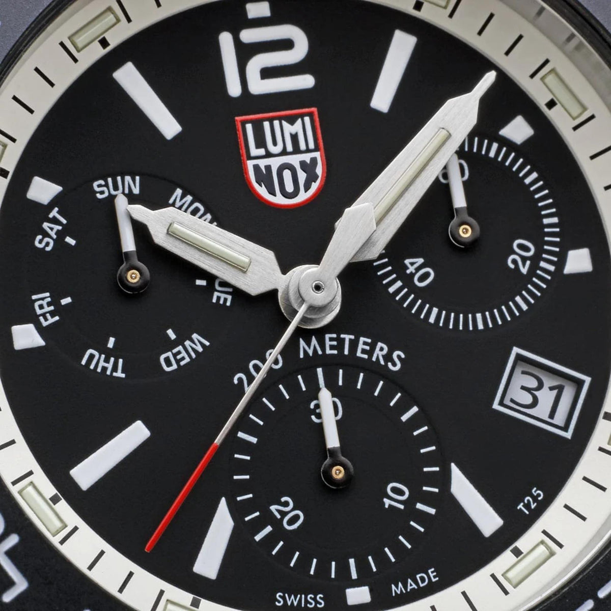 Close-up of men's diver chronograph watch dial with subdials and Luminox logo on black face