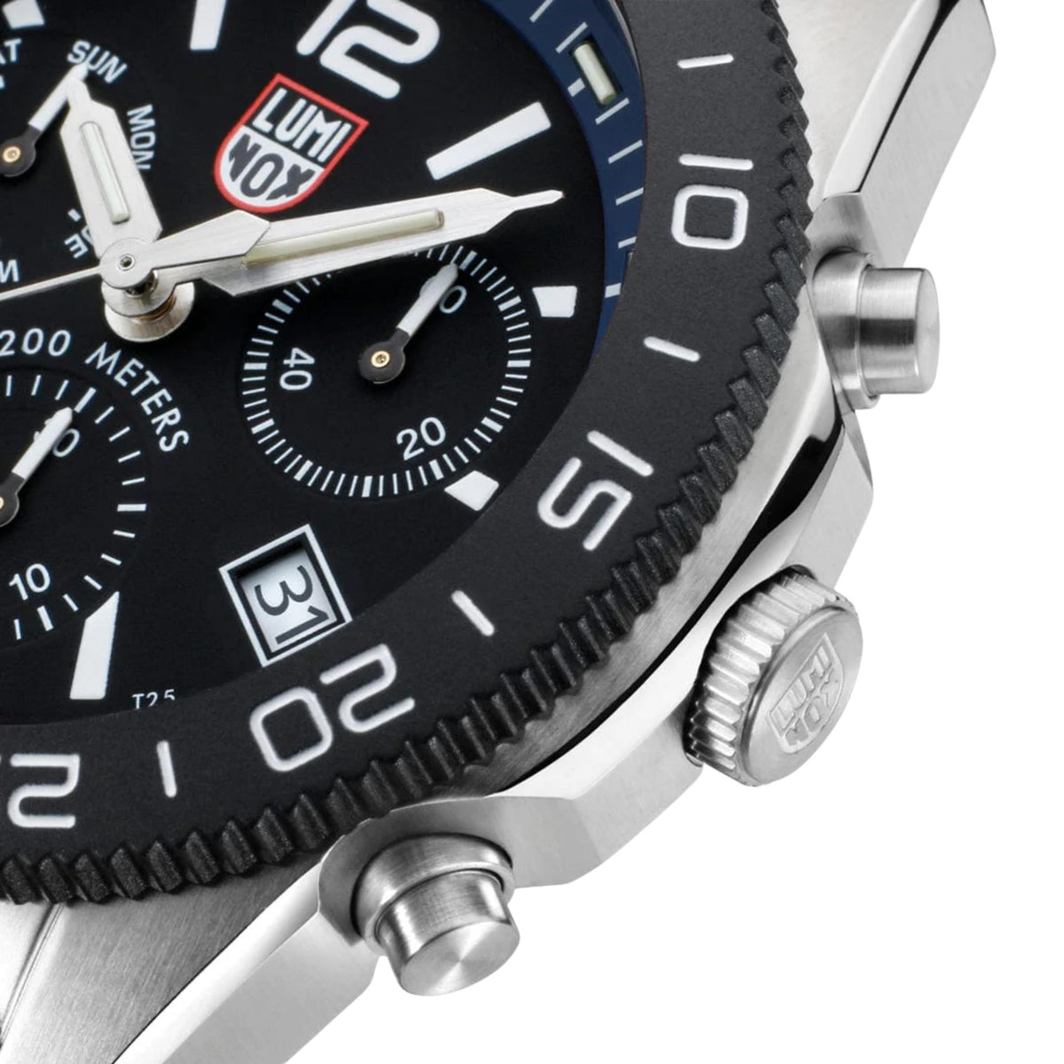 Close-up of black dial dive watch with blue bezel and crown details
